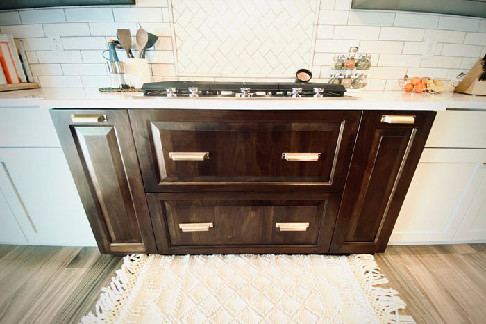 the-design-studio-breese-kitchen-dark-cabinet-stove-image